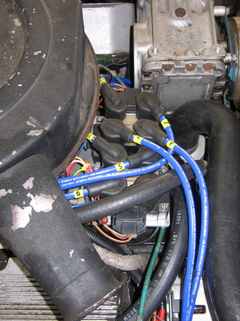 The EDIS module is mounted on a bracket forward of the radiator mounts away from the prodigious engine bay heat.  The MJLJ is mounted in the glove box.
