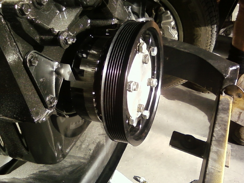 Aluminium adapter holds 8 groove pulley and trigger wheel.