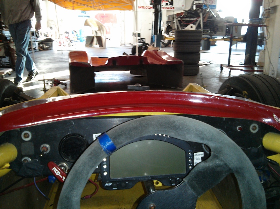 Cockpit view with bodywork and wheel installed.