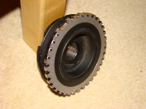 Trigger wheel mounted on the standard crank damper/pulley