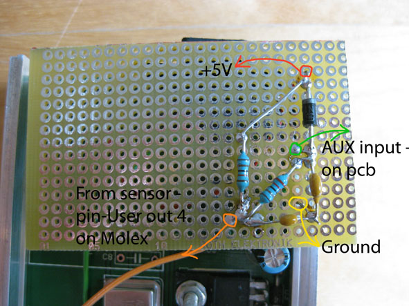Experimental board with signal circuit to protect processor. Text shows how it is wired.