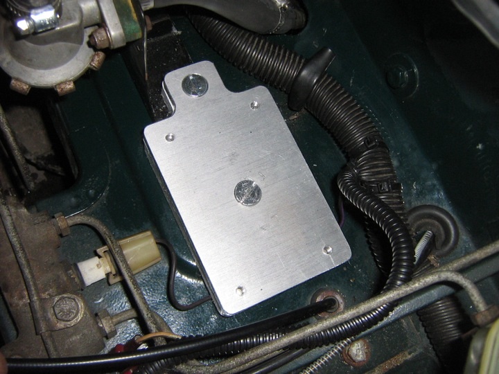 coil pack interface plate